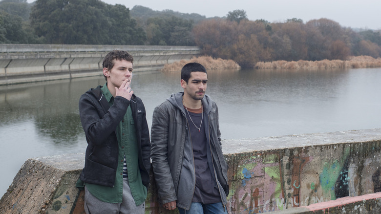 Ander and Omar outside near the water