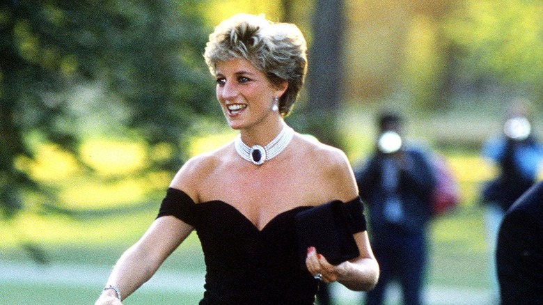 Princess Diana walking in black dress