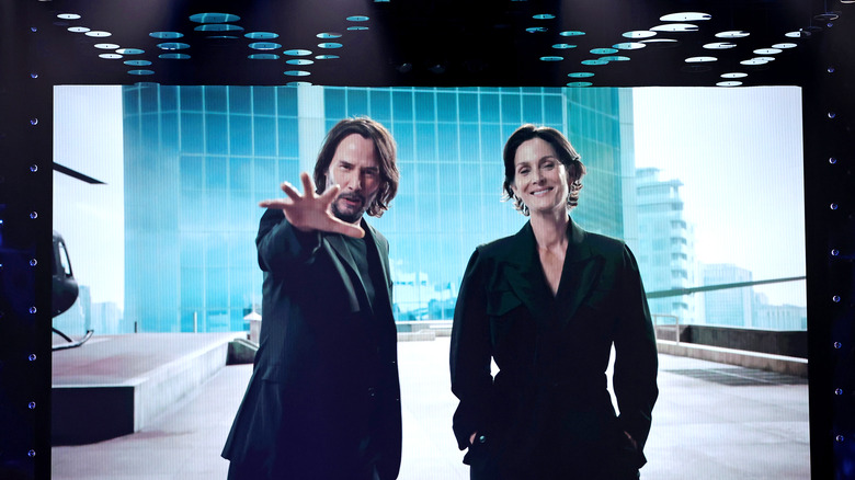 Carrie-Anne Moss and Keanu Reeves appearing at the 2021 Game Awards