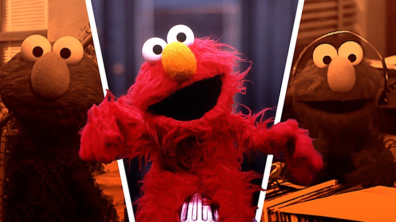 Elmo hands in air