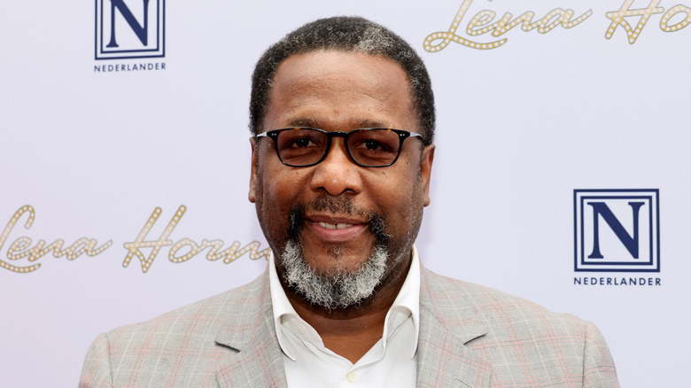 Wendell Pierce greying beard tinted glasses