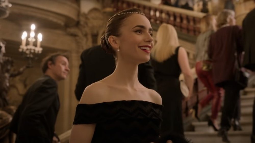 Emily (Lily Collins) attends a performance during a scene included in Netflix's Emily in Paris trailer.