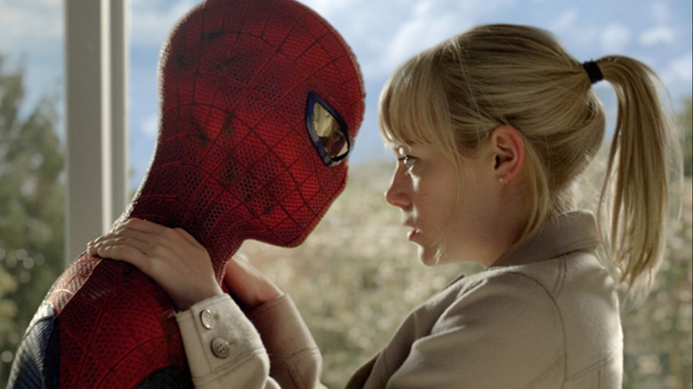 Gwen Stacy holding Spiderman