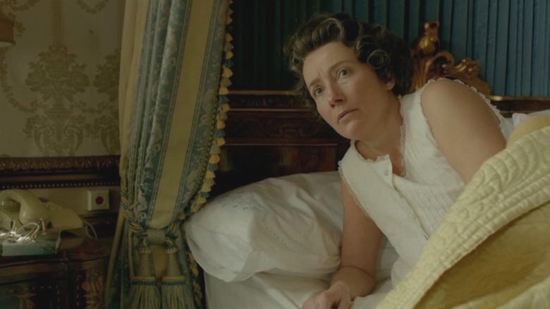 Emma Thompson portraying the Queen