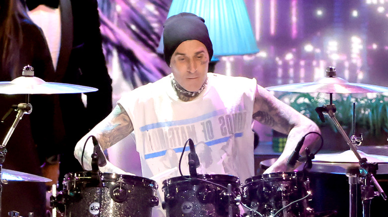 Travis Barker playing drums 