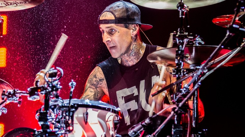 Travis Barker playing drums 