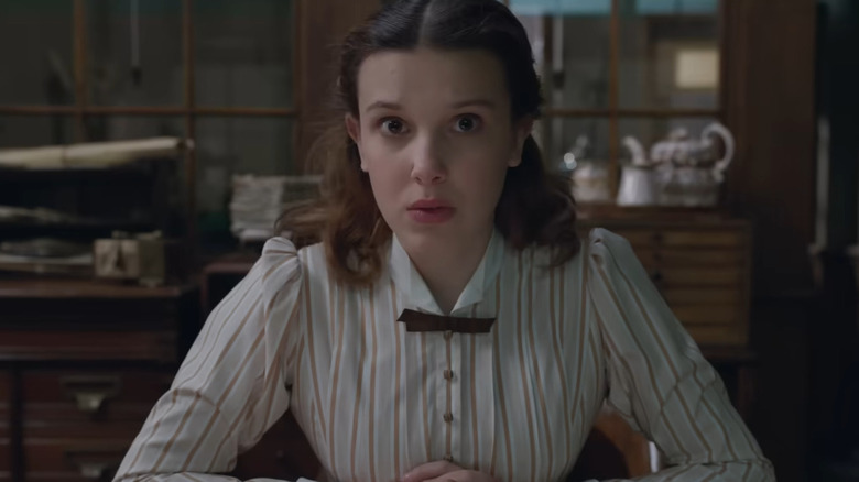 Millie Bobby Brown at desk