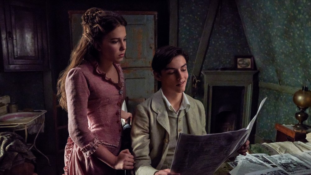 Millie Bobby Brown and Louis Partridge in Enola Holmes