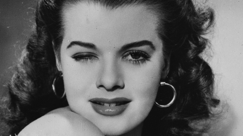 Janis Paige winks