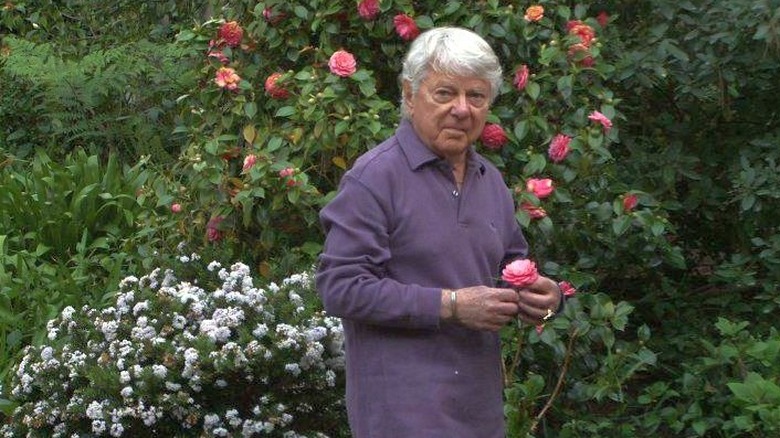 Ralph Senensky in a garden 