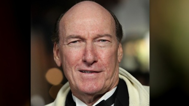 Ed Lauter smirking