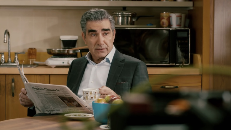 Eugene Levy drinking coffee