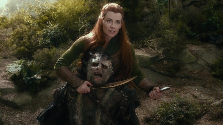 Tauriel holds knife to orc