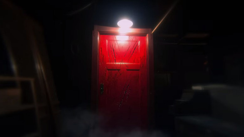 The red door illuminated by light