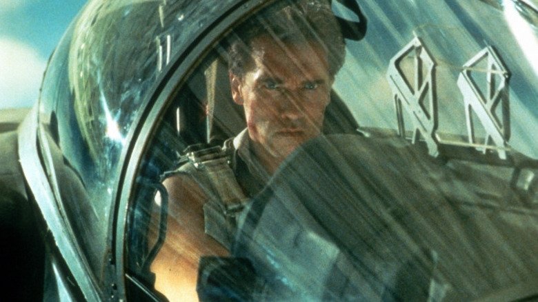 Arnold in a jet cockpit