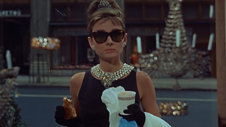 Holly Golightly eating