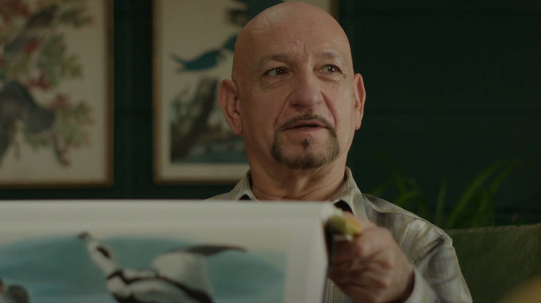 Ben Kingsley with a bird painting