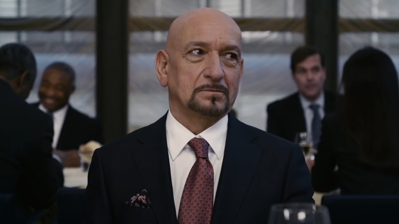 Ben Kingsley in suit at dinner