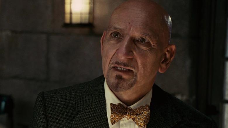 Ben Kingsley talking in bowtie and suit