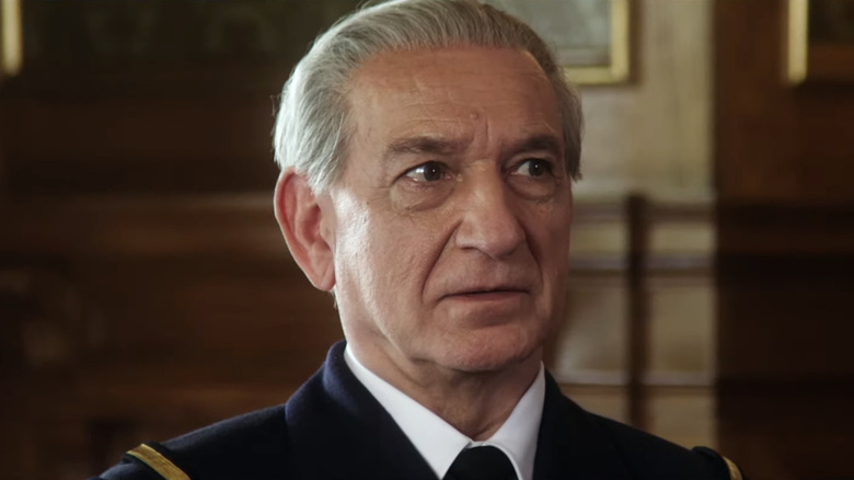 Ben Kingsley in uniform with grey hair