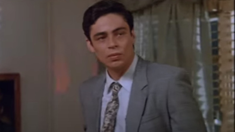 Benicio Del Toro wearing gray suit