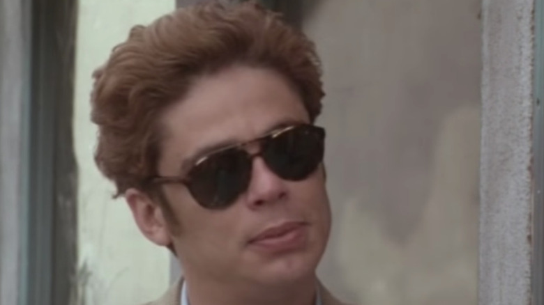 Benicio Del Toro wearing sunglasses