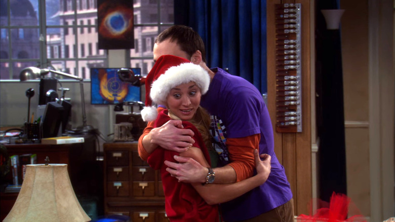 Sheldon hugging Penny