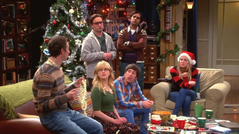 The gang decorating the Christmas tree.