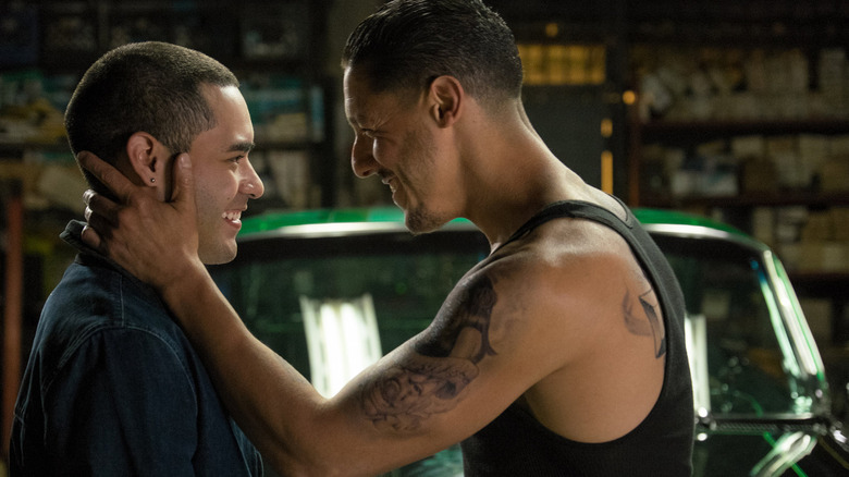Gabriel Chavarria and Theo Rossi laughing