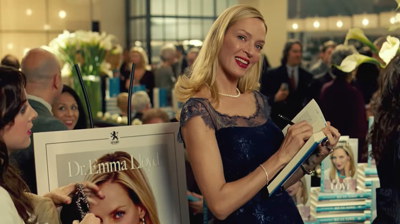 Uma Thurman signing a book