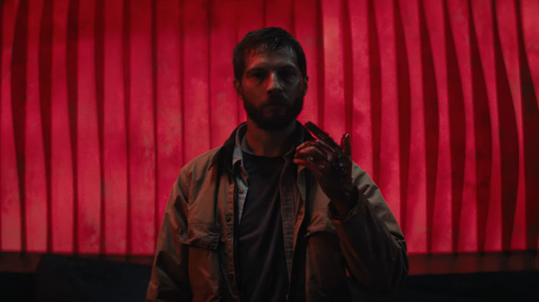 Logan Marshall-Green in a red room