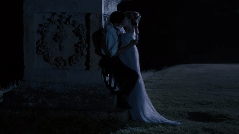 Rege-Jean Page and Phoebe Dynevor embrace as Simon and Daphne in Bridgerton