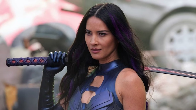 Psylocke with weapon over shoulder