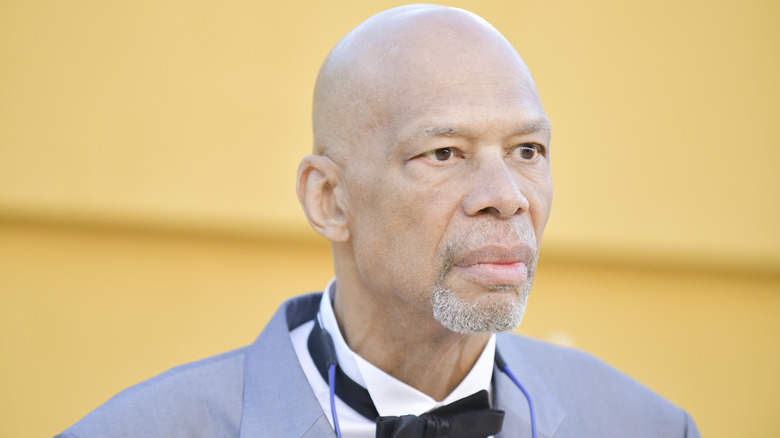 Kareem Abdul-Jabar in a blue suit