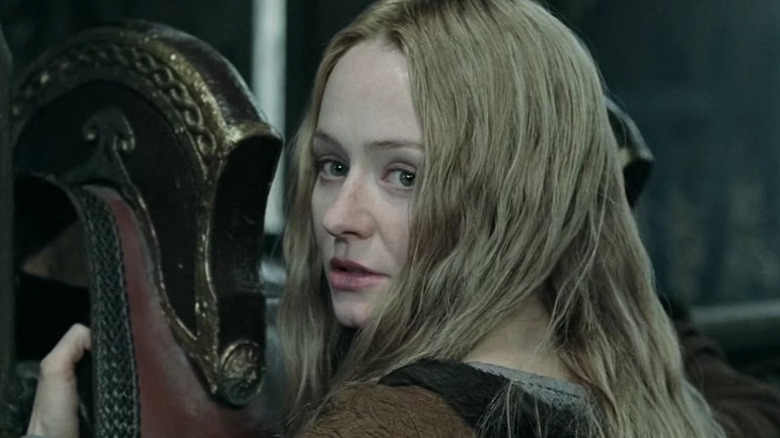 Close up of Éowyn holding saddle