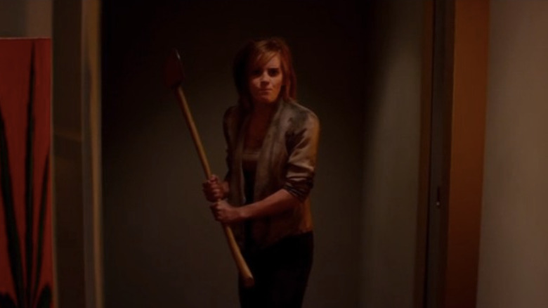 Emma Watson holding ax