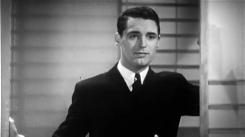 Cary Grant enters the room