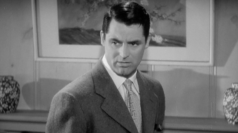 Cary Grant looks left