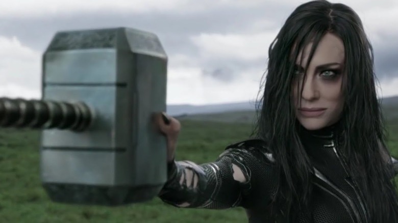 Hela grabbing Thor's hammer