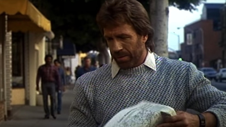 Chuck Norris reading newspaper