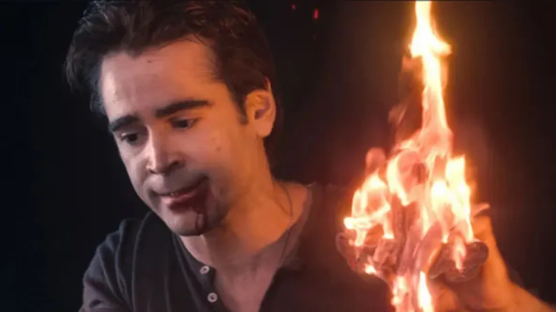 A bloodied Colin Farrell smiles in Fright Night