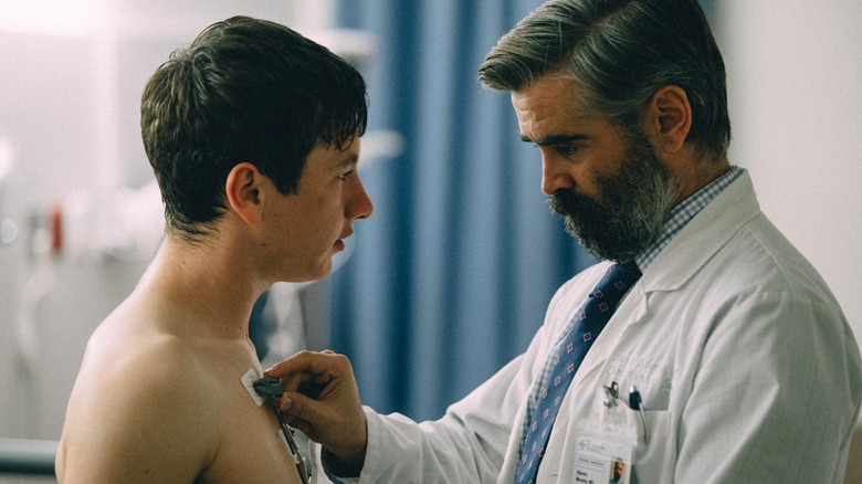 Colin Farrell examines Barry Keoghan in The Killing of a Sacred Deer