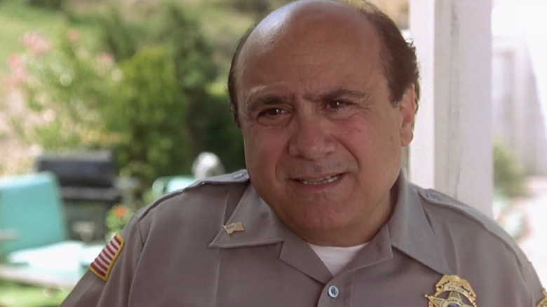 Danny DeVito in a police uniform