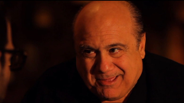 Danny DeVito smiles