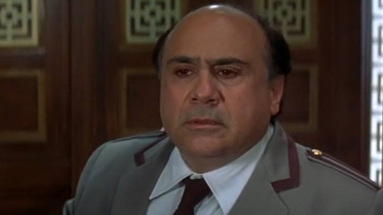 Danny DeVito dressed as an elevator operator