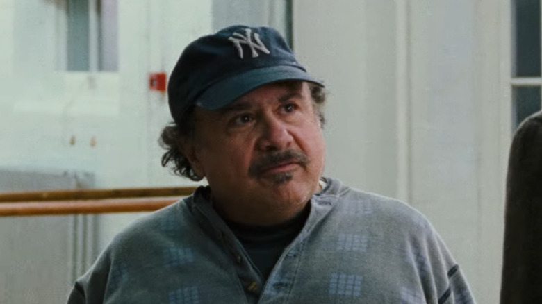 Danny DeVito wears a New York Yankees ballcap