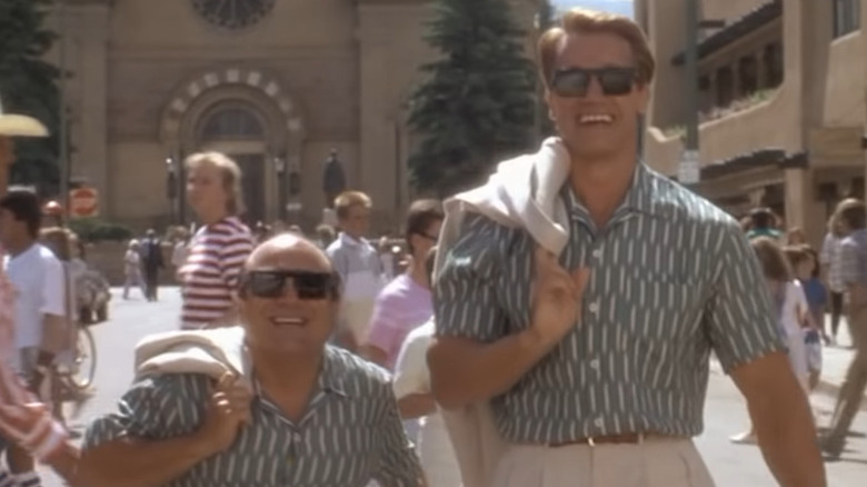 Danny DeVito and Arnold Schwarzenegger in matching outfits