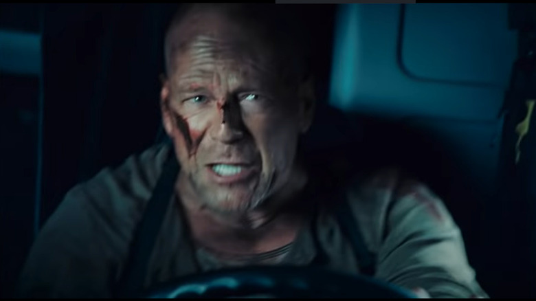 John McClane Driving Bloody