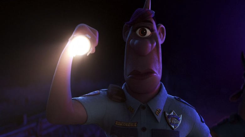 Officer Specter shining a flashlight