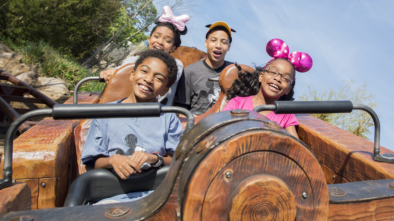 group of kids on mine train